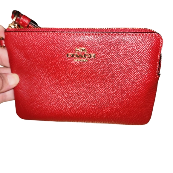 Red Coach Wristlet with two coach bag charms in box - Picture 2 of 6